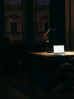 Silver Macbook on Brown Wooden Table